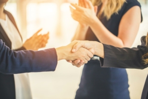 Two people shaking hands